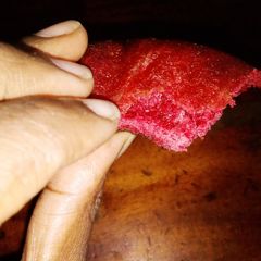 A picture of Fried red velvet donuts.