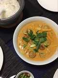 Chicken meatball in thai red curry sauce