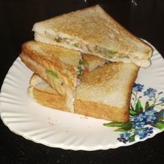 A picture of Aloo veg sandwich on tawa.