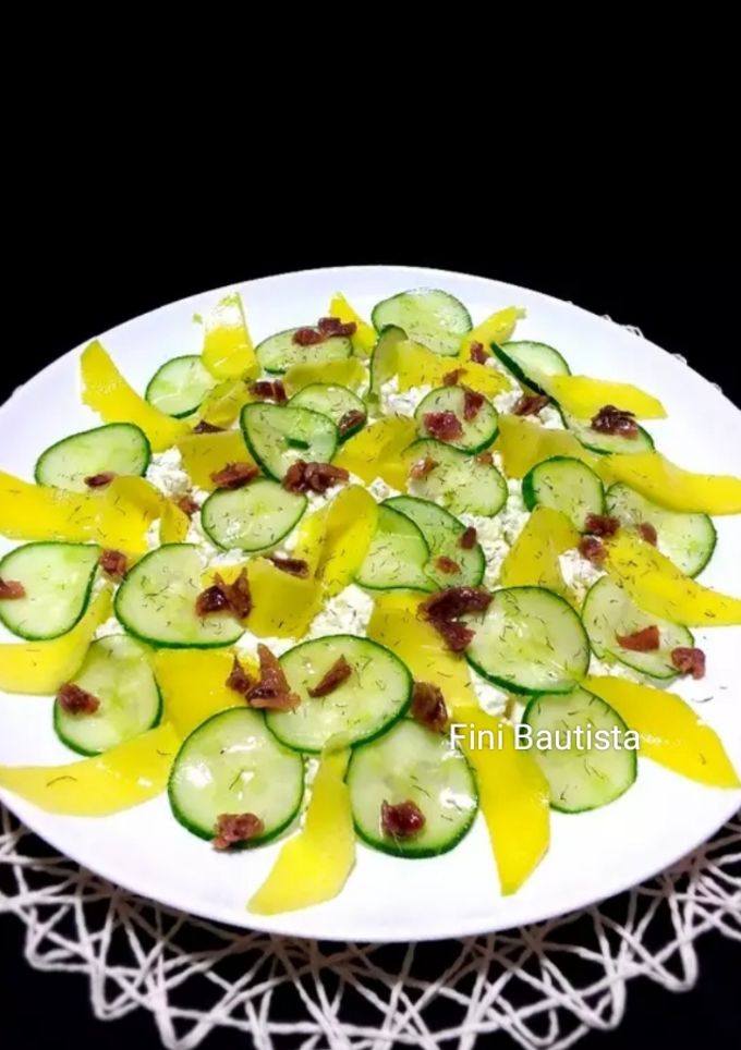 Una foto de Ensalada de queso fresco pepino y mango
