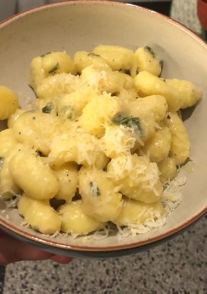 A picture of Pumpkin gnocchi with truffle oil and sage.