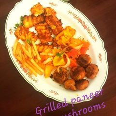 A picture of Grilled Paneer and Mushrooms.
