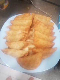 Una foto de Empanadas de secreto ibérico con bechamel de roquefort