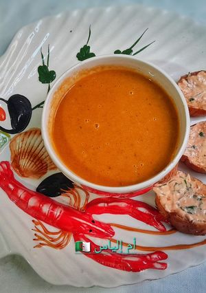 A picture of Fish Soup with Buttered Toasted Bread.