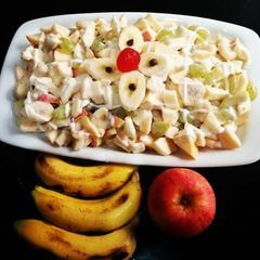 A picture of Creamy Fruit chaat🍌🍎🍇🍋.