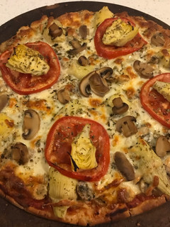 Una foto de Pizza vegetariana