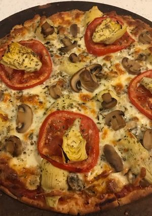 Una foto de Pizza vegetariana