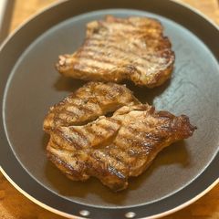 A picture of Port & Blackcurrant marinated Pork shoulder steaks.