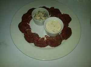 Una foto de Carpaccio de lomito