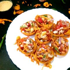 A picture of Tomato Bhajia Katoori Chaat.