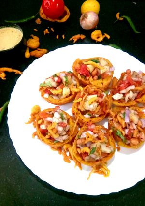 A picture of Tomato Bhajia Katoori Chaat.