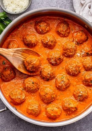 A picture of Turkey Meatballs in Roasted Red Pepper Sause.