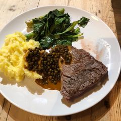 A picture of Bristol Steak, mash, spinach & asparagus.
