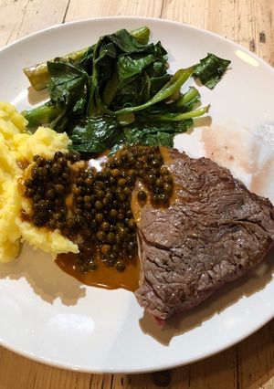 A picture of Bristol Steak, mash, spinach & asparagus.