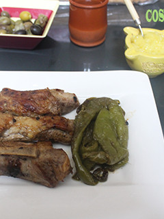 Una foto de Costillas de cerdo con pimientos y patatas