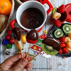 A picture of Fruit Chocolate Fondue🍓🍊🥝🍫.