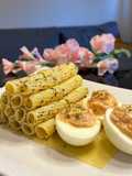 Rigatoni con aroma de albahaca y huevos rellenos de atún