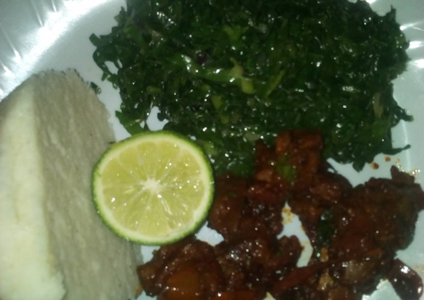 Fried beef and steamed sukuma wiki
