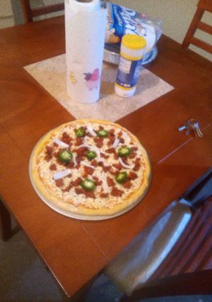 Una foto de Pizza hawaiana