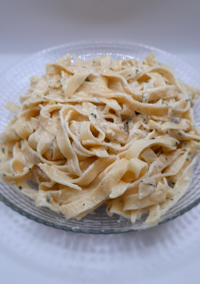 Una foto de Tagliatelle en queso gorgonzola