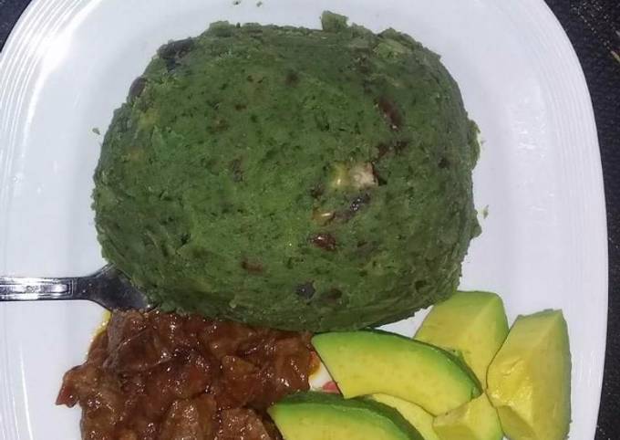 Mukimo served with fried beef and avocado