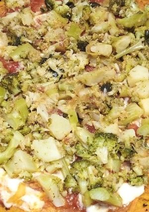 Una foto de Pizza de zanahoria con brócoli