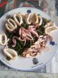 Anelli di calamari al vapore con limone