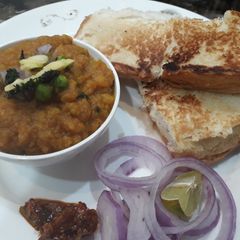 A picture of Pumpkin bhaji pav.