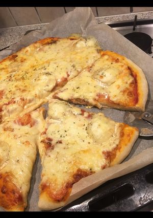 Une photo de Pizza