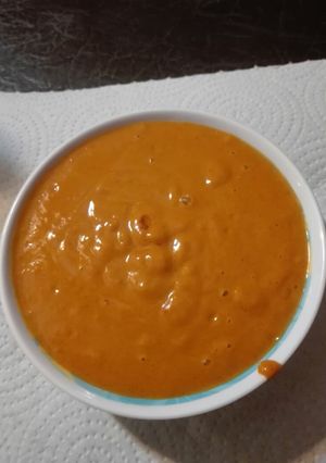 Una foto de Mojo rojo muy picante, aderezo para carne caribeño