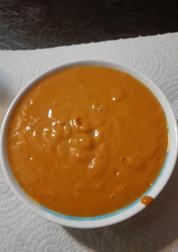Una foto de Mojo rojo muy picante, aderezo para carne caribeño
