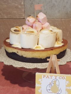 Una foto de Cheesecake de chocolate "sobao" en las nubes