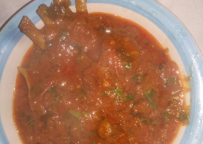 Fresh tomatoes and goat meat