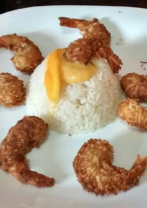 Una foto de Camarones al coco con salsa de mango