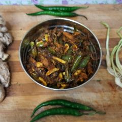 A picture of Green garlic, green chilli ginger pickle.