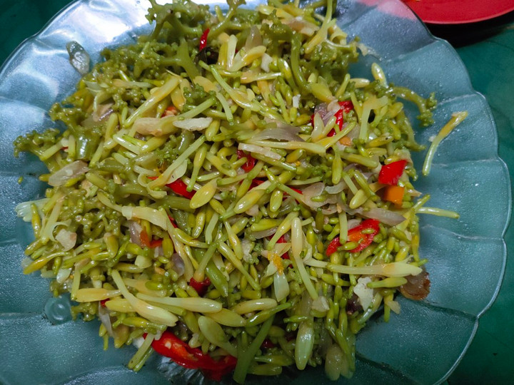 Bagaimana Membuat Tumis kembang pepaya yang Enak