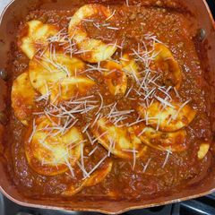 A picture of Ravioli with Meat Sauce.