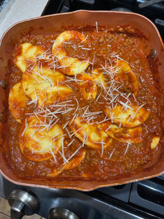 A picture of Ravioli with Meat Sauce.