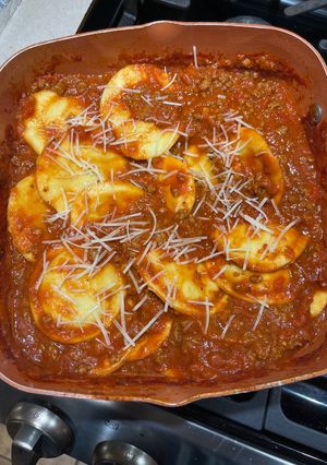 A picture of Ravioli with Meat Sauce.