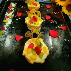 A picture of Rice Tarts With Fruity Phirni.