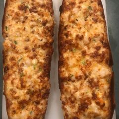 A picture of Loaded cheesy garlic bread.