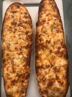A picture of Loaded cheesy garlic bread.
