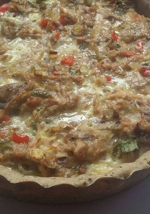 Una foto de Tarta integral con semillas, rellena de atún