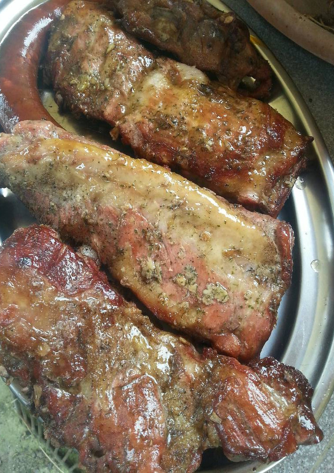 Una foto de Costillas de cerdo asadas al horno de leña