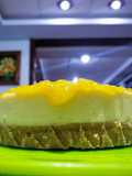 Cheesecake c/ compota de mango y durazno
