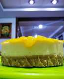 Cheesecake c/ compota de mango y durazno