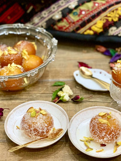A picture of Gulab Jamun (Milk doughnut balls).
