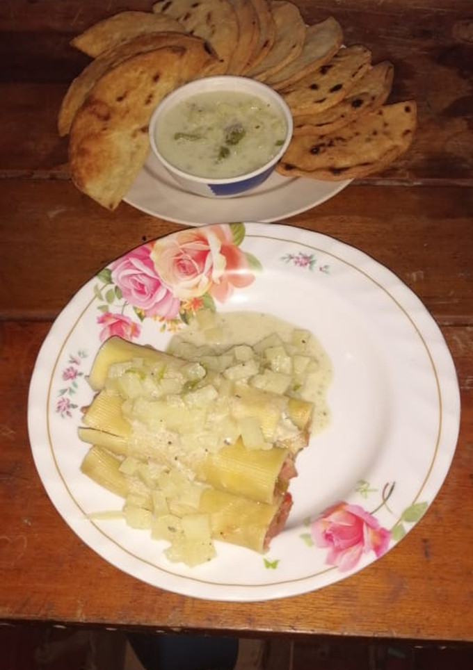 Una foto de Canelones de jamón en crema de papas....🇸🇻