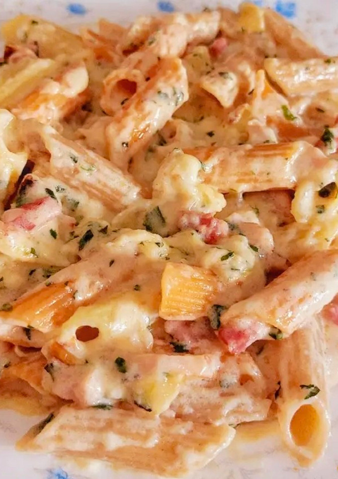 Una foto de Pasta gratinada con salsa blanca