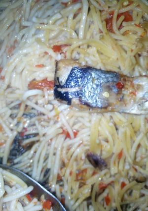 A picture of Concoction spagetti and fish.